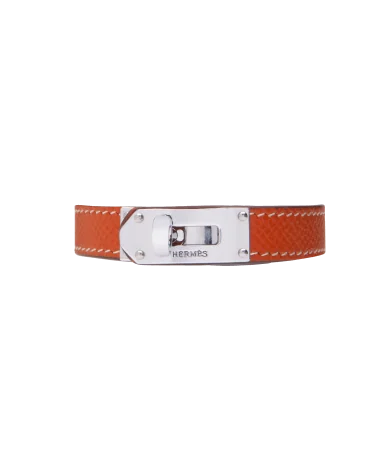 Armband des Luxuslabels Hermès aus Stahl und orangefarbenem Leder. Erhältlich bei VIRTU LUXURY.