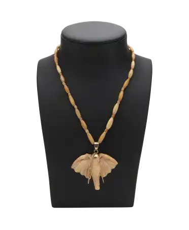 MAJESTUEUX Necklace is a necklace in the shape of an elephant in the center. Available at VIRTU LUXURY.