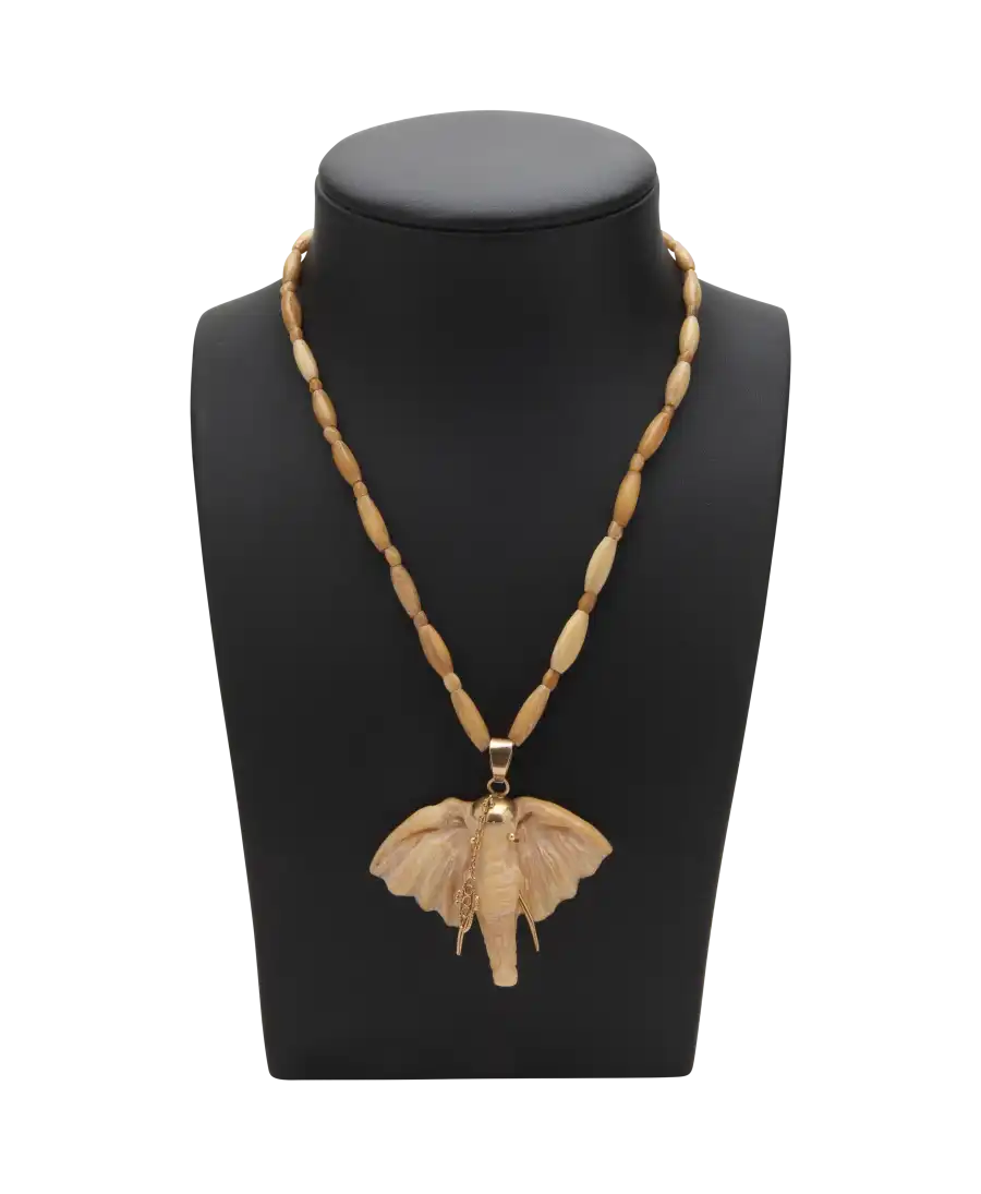MAJESTUEUX Necklace is a necklace in the shape of an elephant in the center. Available at VIRTU LUXURY.